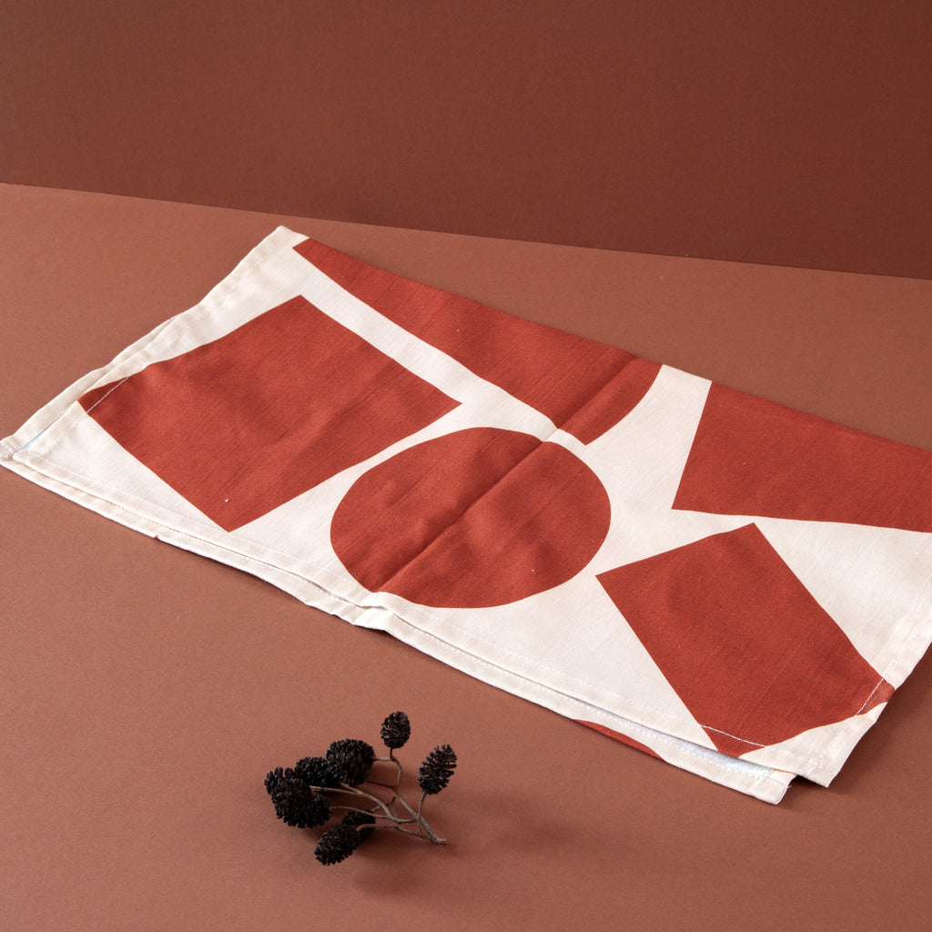 Ola Organic Cotton Wrap with Shapes Print in Salmon and Red. Made in Japanese Furoshiki style, washable and reusable.