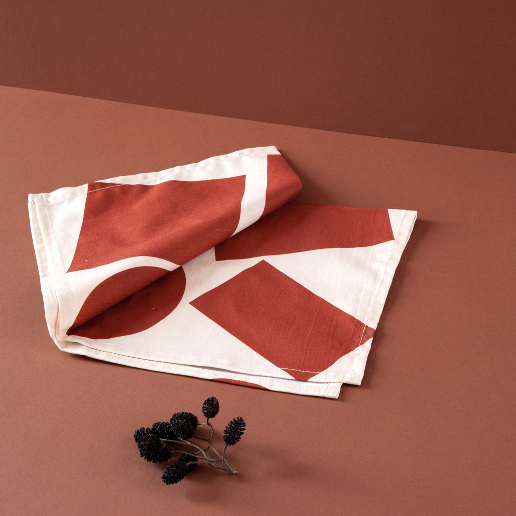 Ola Organic Cotton Wrap with Shapes Print in Salmon and Red. Made in Japanese Furoshiki style, washable and reusable.