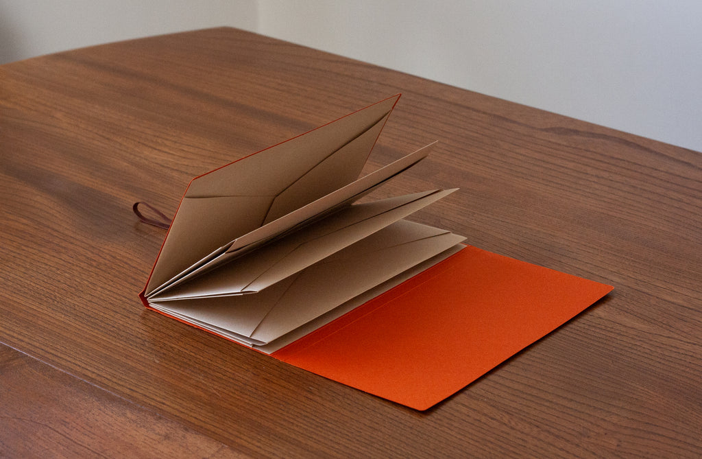 Poi Co. Origami Folder in Vermilion Orange